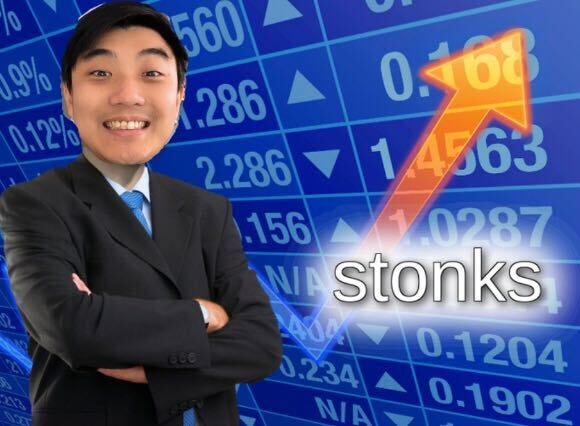 Stonks meme showing smiling businessman in suit with arms crossed in front of rising stock chart with text 'stonks.' Caption: I shared this meme with my co-founders and they immediately turned it into a Slack emoji. We now use it whenever we land a Shopify Plus merchant.