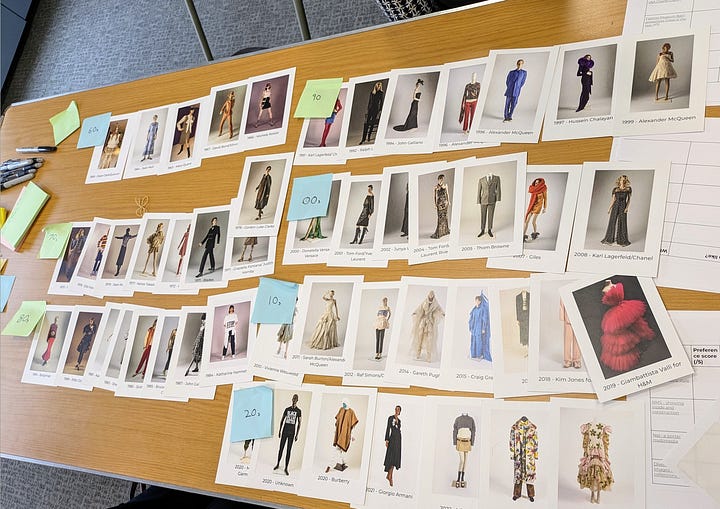 The first image shows a large table covered with printed fashion images from different decades, designers and labels, with coloured sticky notes marking decades or scores.  The second image shows close-up sticky notes with instructions like grouping chronologically, filtering by designer or fabric, and linking items across collections.