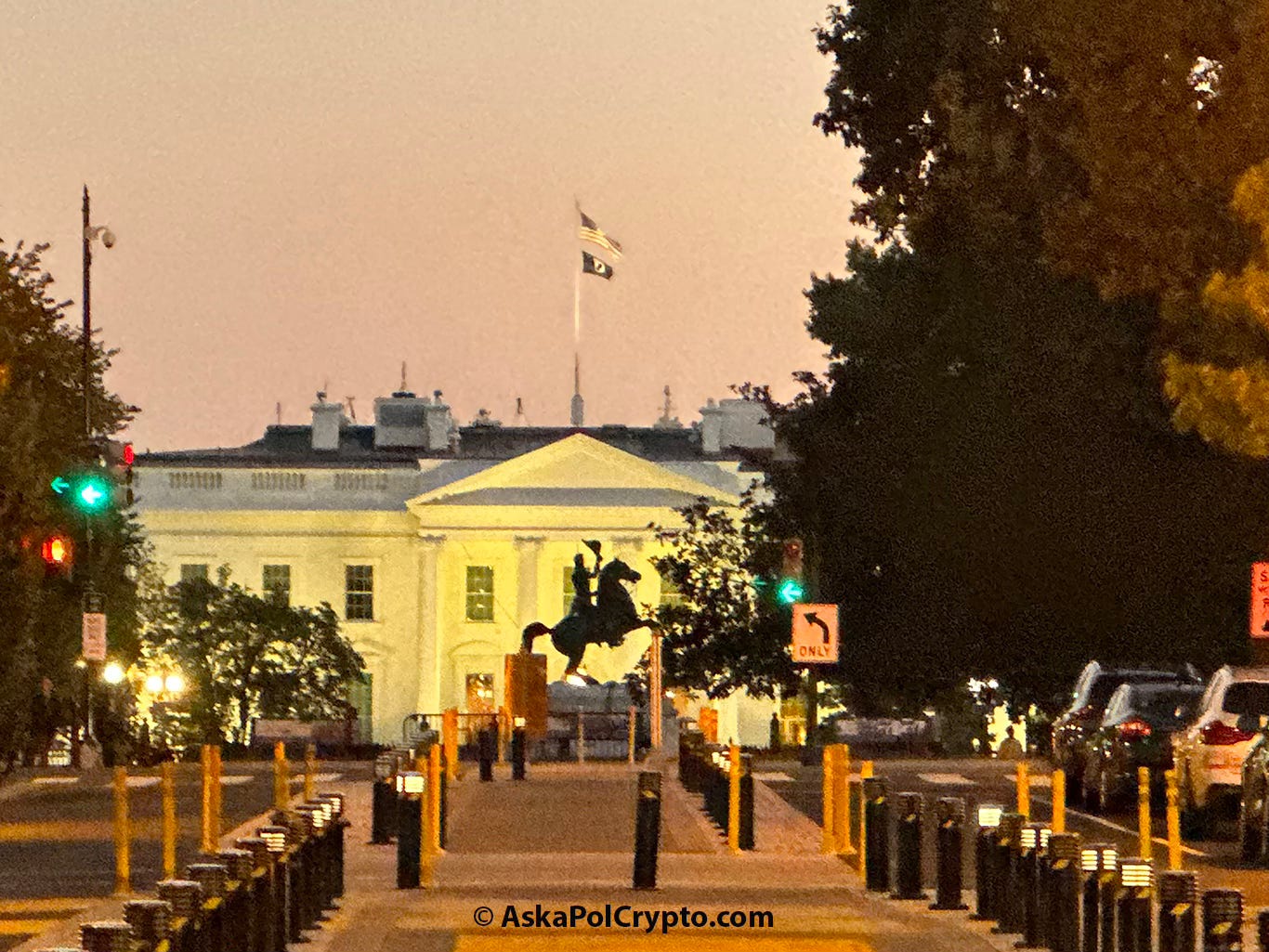 View of the White House from north at dusk with silhouette of a statue of Andrew Jackson in foreground - © AskaPolcrypto.com