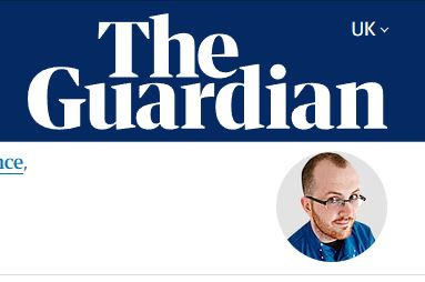 A person with glasses and a blue shirt

AI-generated content may be incorrect.
