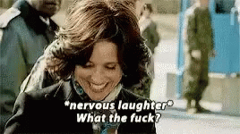 A gif of Serena from VEEP laughing nervously captioned "What the Fuck"