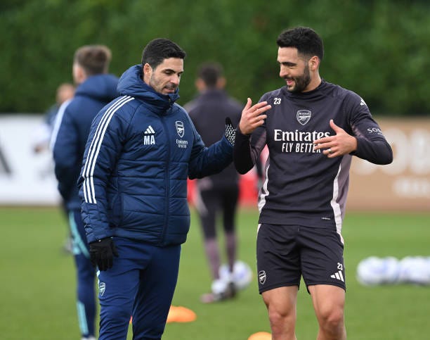 Arsenal manager Mikel Arteta talkis to Mikel Merino during a training session at Sobha Realty Training Centre on February 21, 2025 in London Colney,...