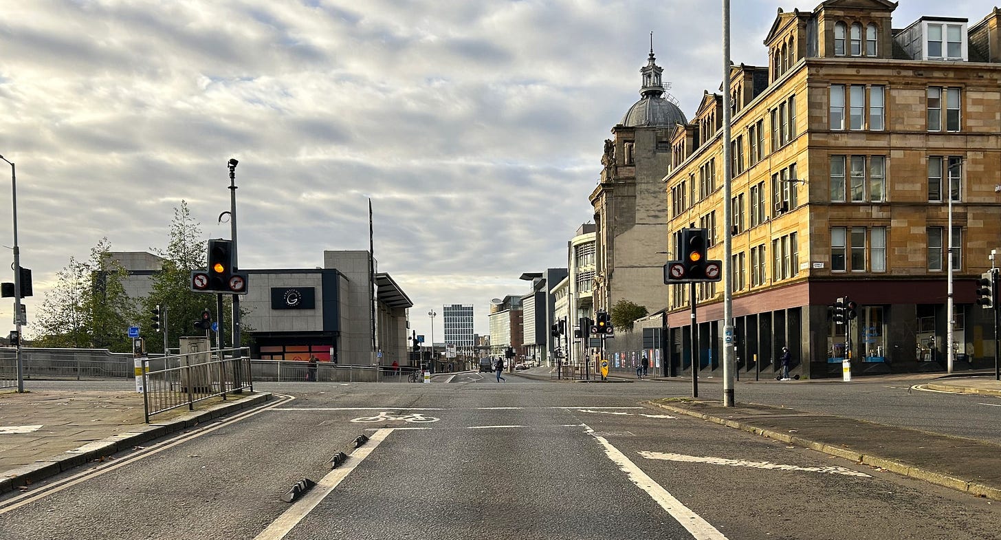 May be an image of 4 people, street and road