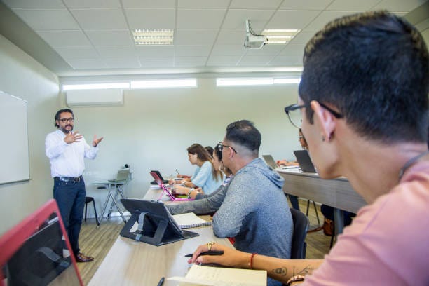 College teacher in class