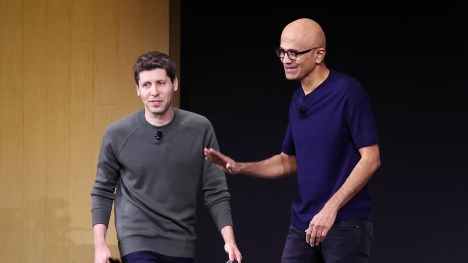 Microsoft CEO Satya Nadella (R) greets OpenAI CEO Sam Altman during the OpenAI DevDay event on November 06, 2023 in San Francisco, California.