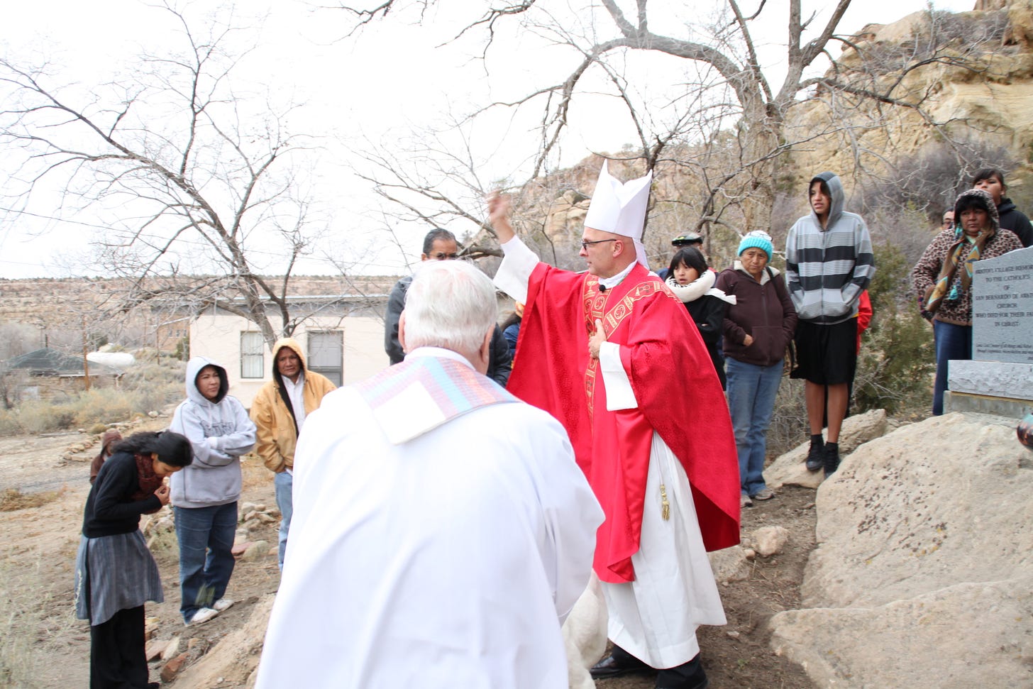 Bishop Wall blesses the people at Keams Canyon.