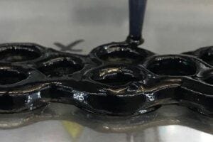 This flexible and conductive material has “adaptive durability,” meaning it gets stronger when hit.
