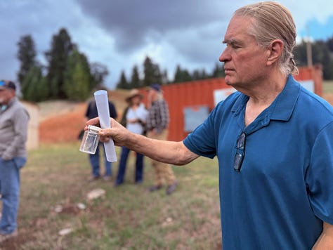 a group tours a wells and springs system and water plant