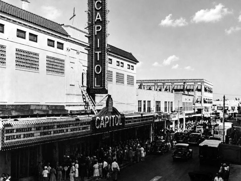 Figure 2: Lines forming outside of the Capitol Theater on opening evening. Courtesy of Wometco.