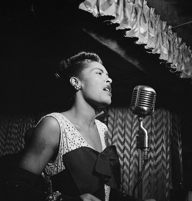 640px-Billie_Holiday,_Downbeat,_New_York,_N.Y.,_ca._Feb._1947_(William_P._Gottlieb_04251)