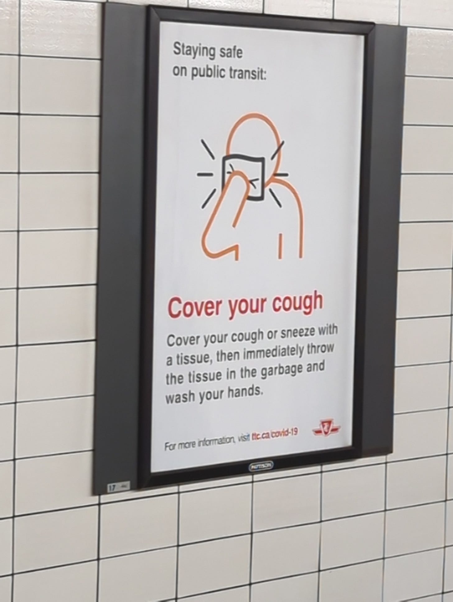 A Toronto transit poster instructing the reader to cover their cough.