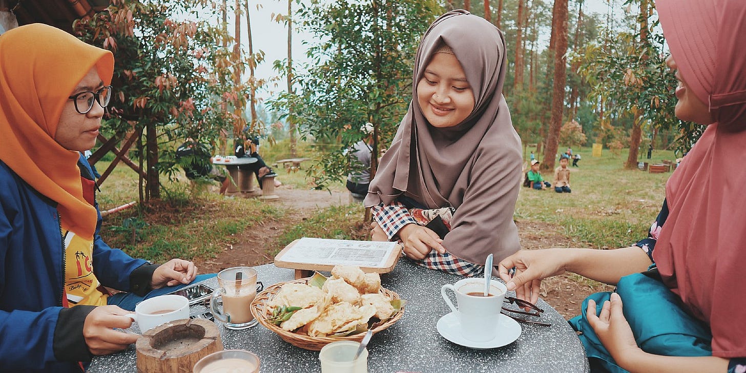 Muslim women enjoying a picnic Muslim women enjoying a picnic