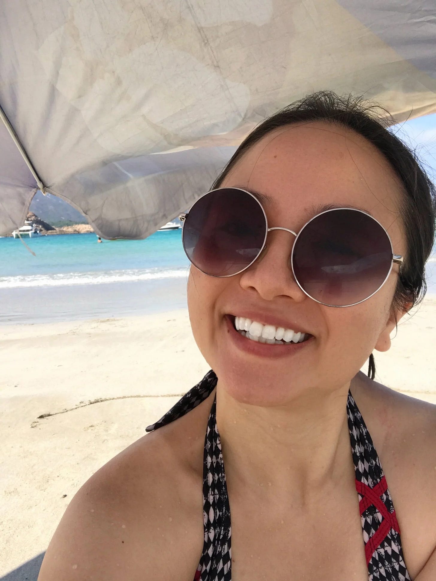  Gorgeous views, shiny sun, and a nice beach umbrella to give me some shade! 