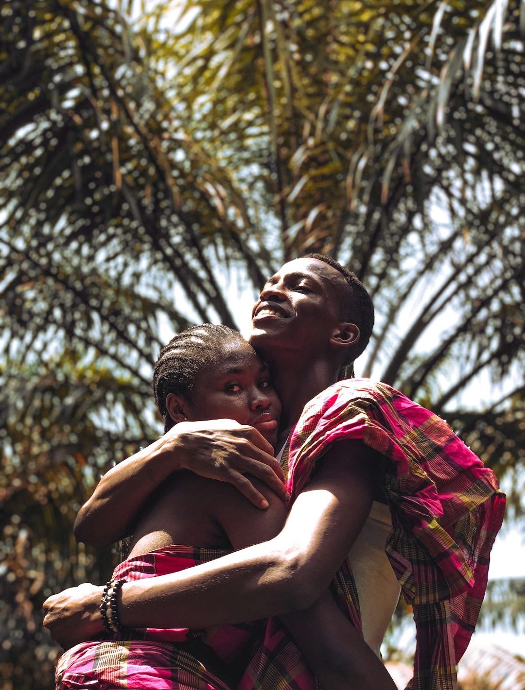 a person holding a child