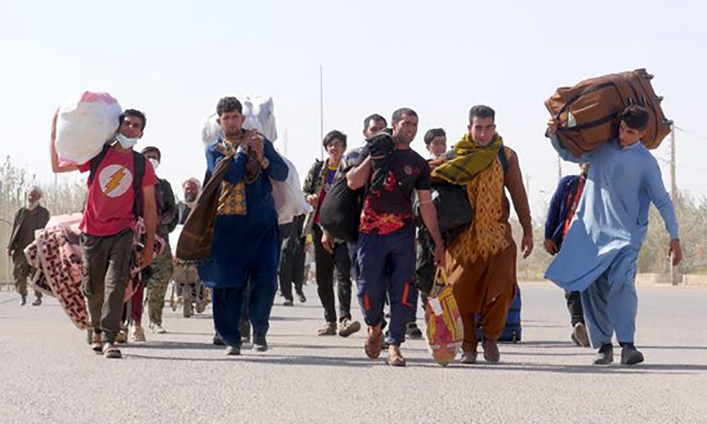 A group of people walking

Description automatically generated with medium confidence