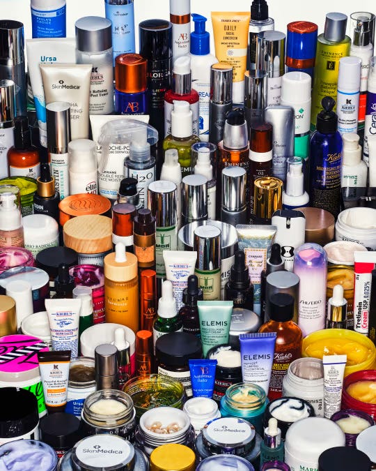 Many skincare products arranged together.