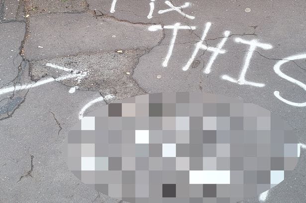 Graffiti criticising the state of the pavement was sprayed on Lochleven Road in Battlefield. Graffiti criticising the state of the pavement was sprayed on Lochleven Road in Battlefield.