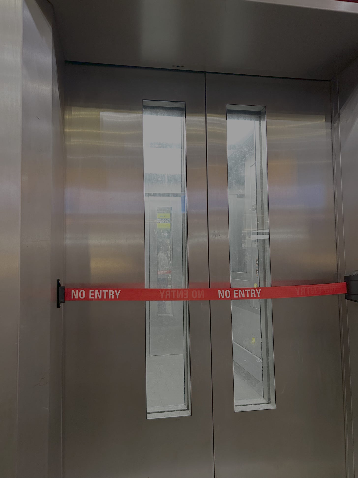 Closed lift with a no entry tape Closed lift with a no entry tape