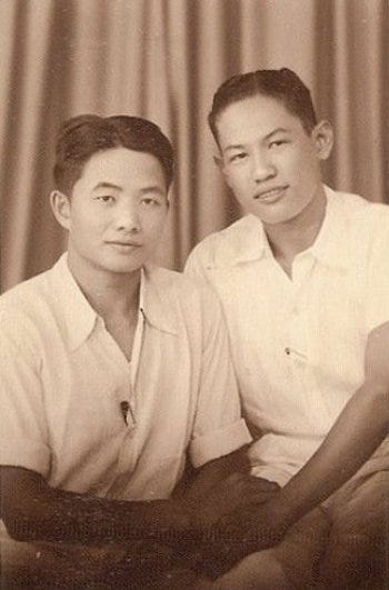 Black and white images of men posing for photos with physical touch.