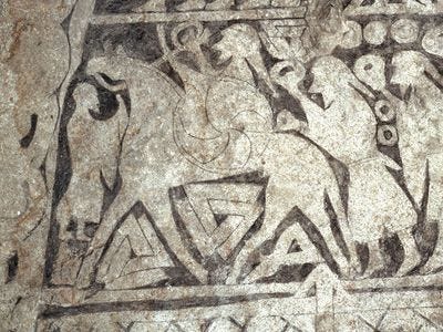 picture stone from Tängelgårda, Sweden, showing three icons resembling a valknut