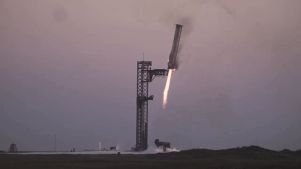 SpaceX catches rocket booster in daring engineering feat