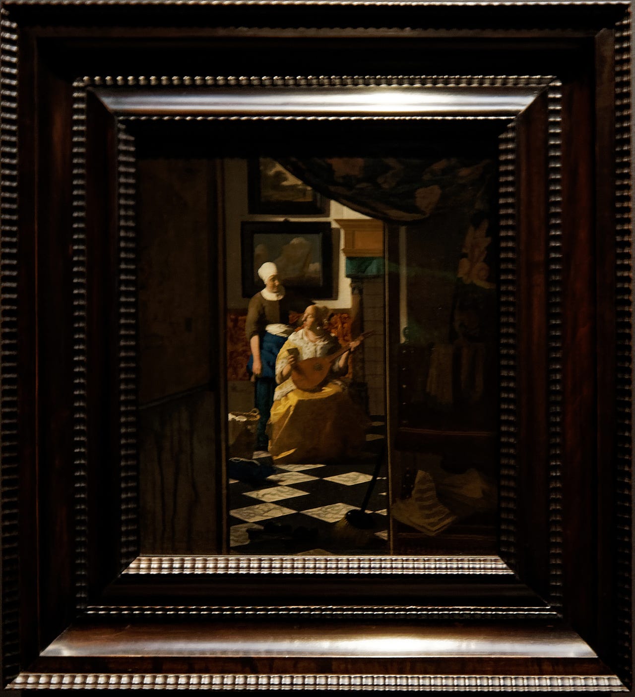 A maid handing a letter to a woman with a lute A maid handing a letter to a woman with a lute