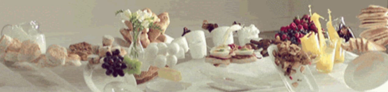 A wide array of food floating over a table