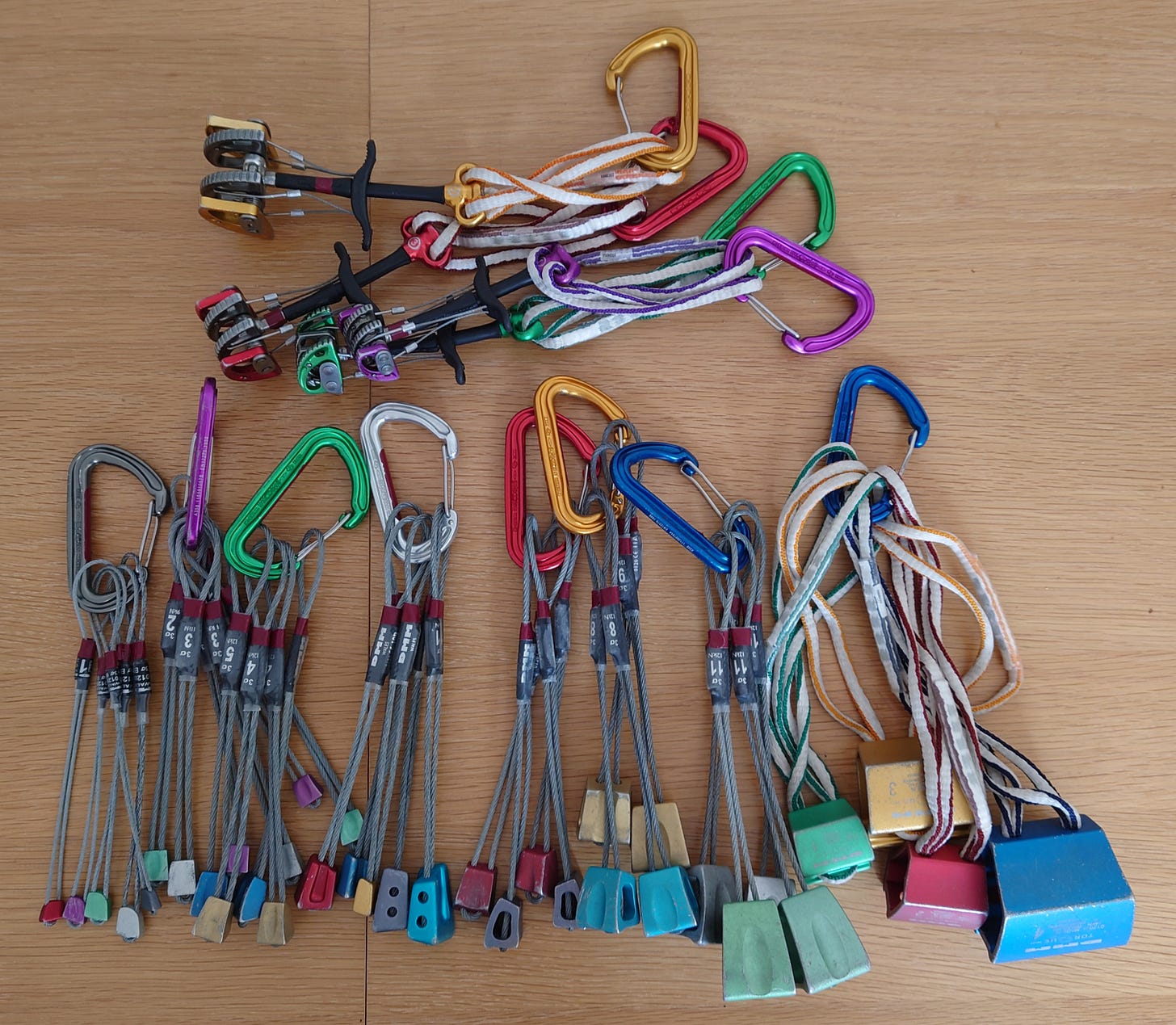 Selection of climbing peanuts, walnuts, hexes and cams.