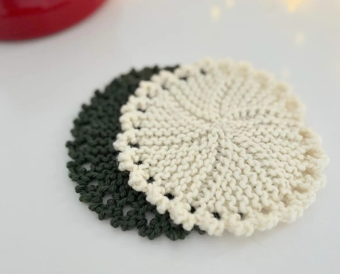 two trivets, one is dark green and the other is off-white