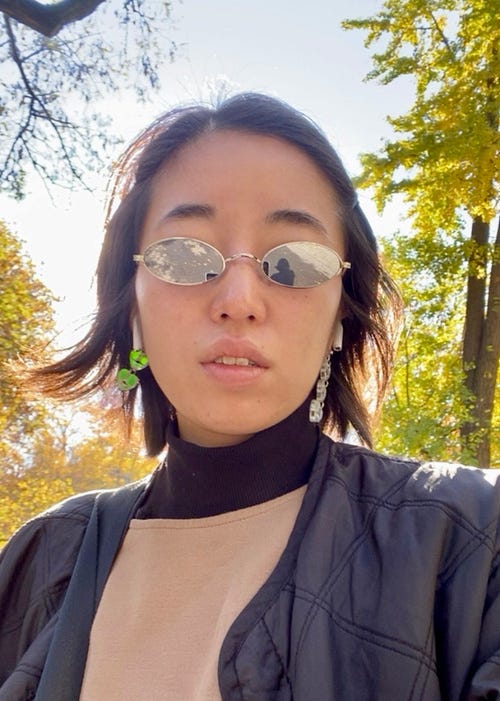 Wearing my acrylic earrings in Central Park Wearing my acrylic earrings in Central Park