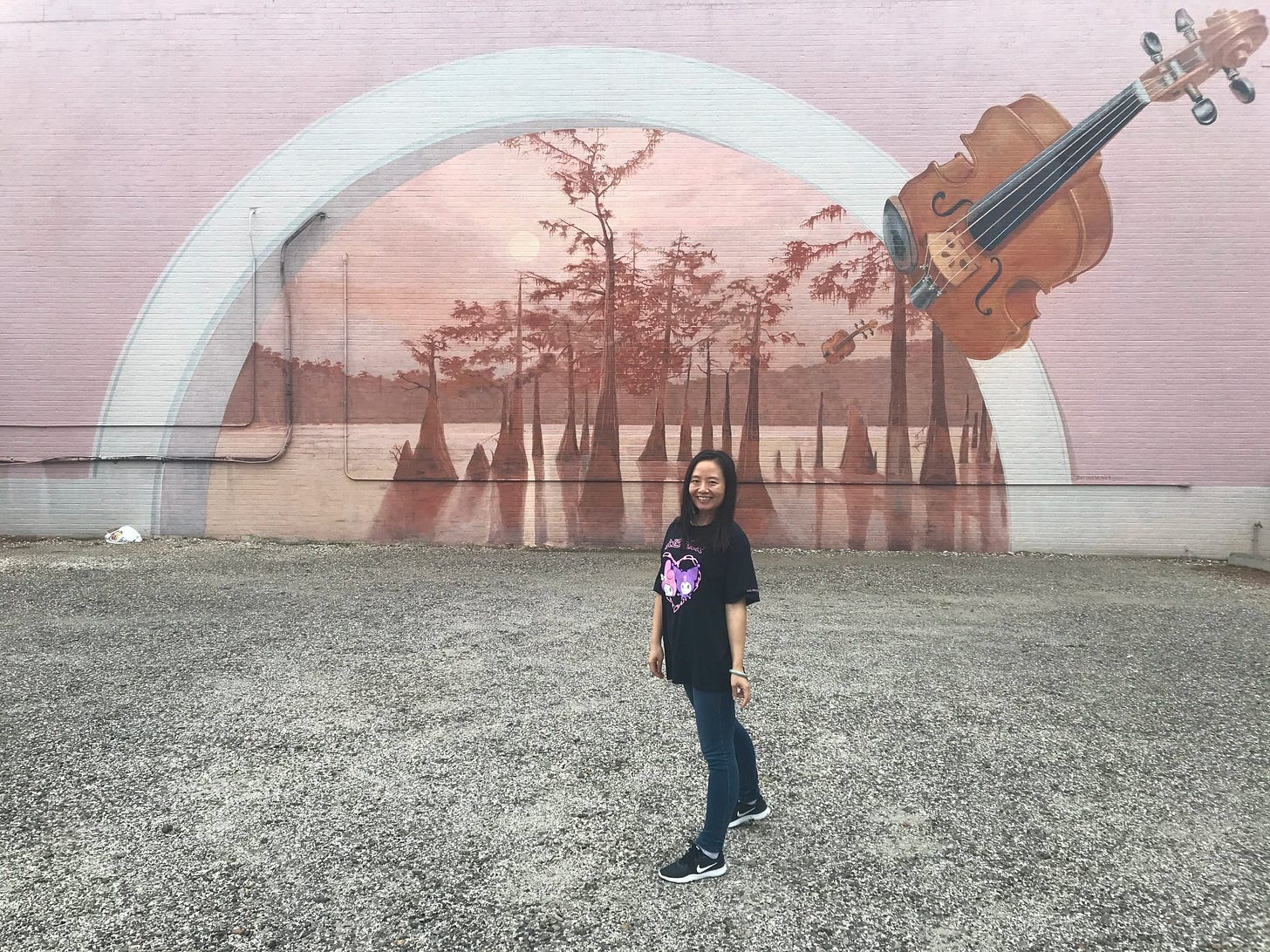  Beautiful pink mural in downtown Lafayette, LA featuring the beautiful trees and the Louisiana bayou! 