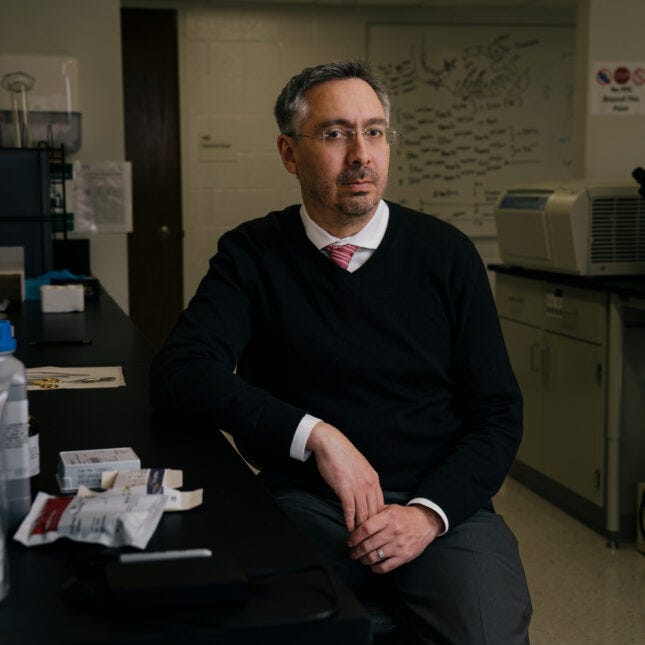 A photo portrait of Luis Rodriguez, a George Washington University researcher who studies lung fibrosis, in his lab. A photo portrait of Luis Rodriguez, a George Washington University researcher who studies lung fibrosis, in his lab.