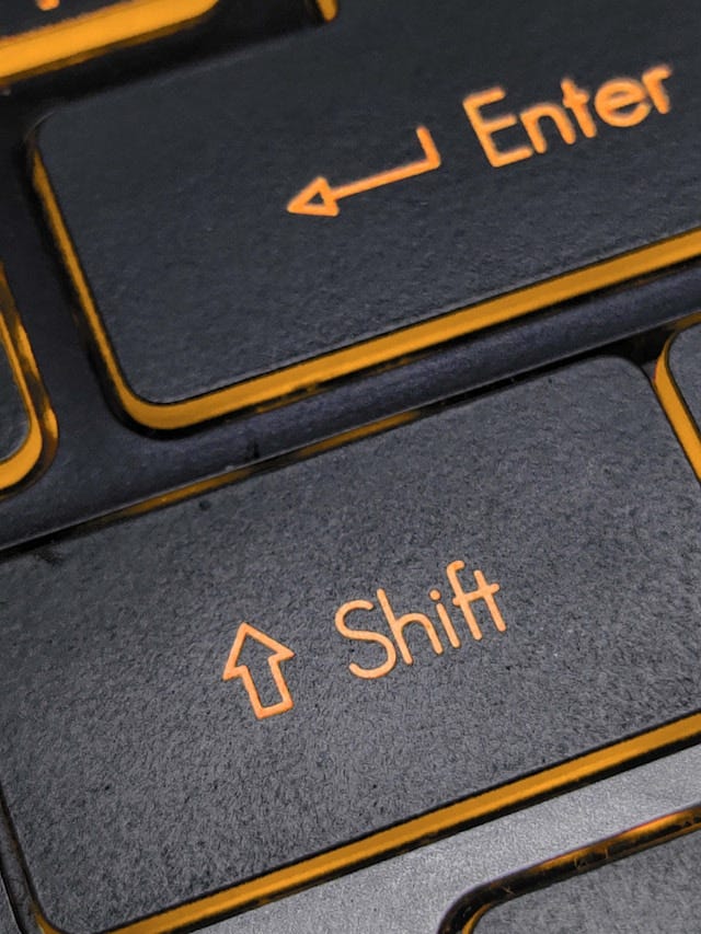 The Enter and Shift keys on a keyboard.