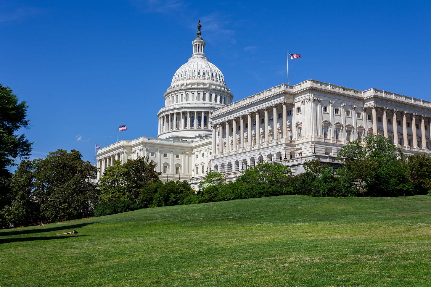 Photo by Simon Gagner on Pexels Stunning photo of the United States Capitol under a clear blue sky, showcasing neoclassical architecture. (stock photo)