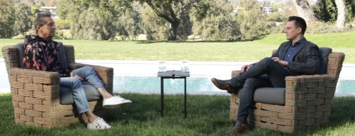Brian Glazer being interviewed by Graham Bensinger