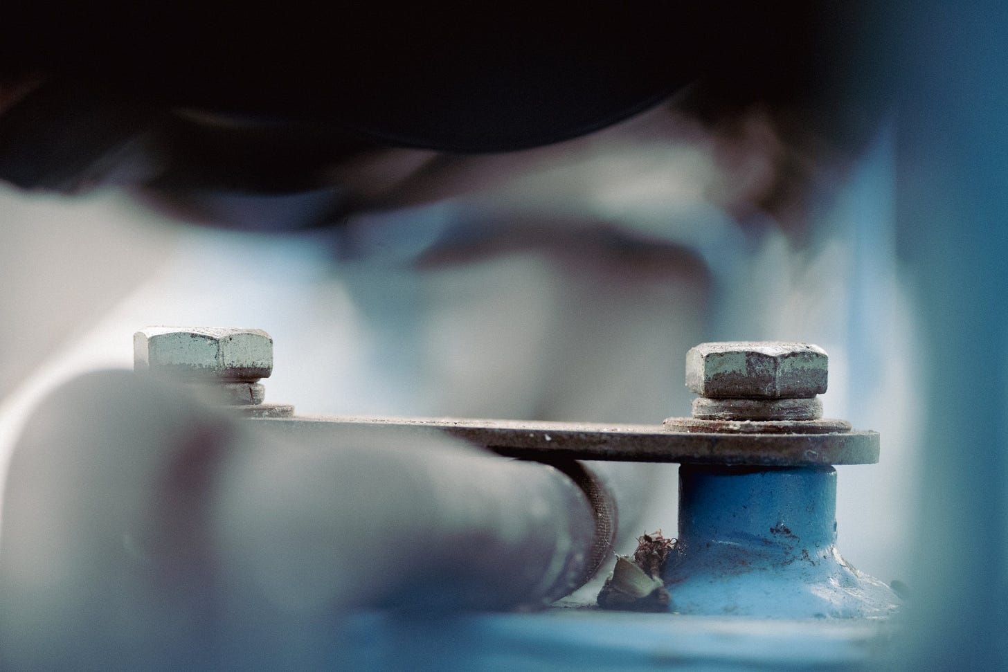 Close-Up of Metal Fasteners and Pipe
