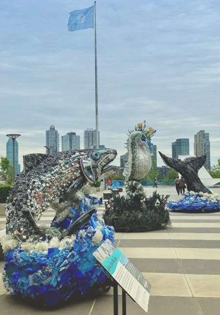 A group of sculptures of fish and a dolphin

AI-generated content may be incorrect.