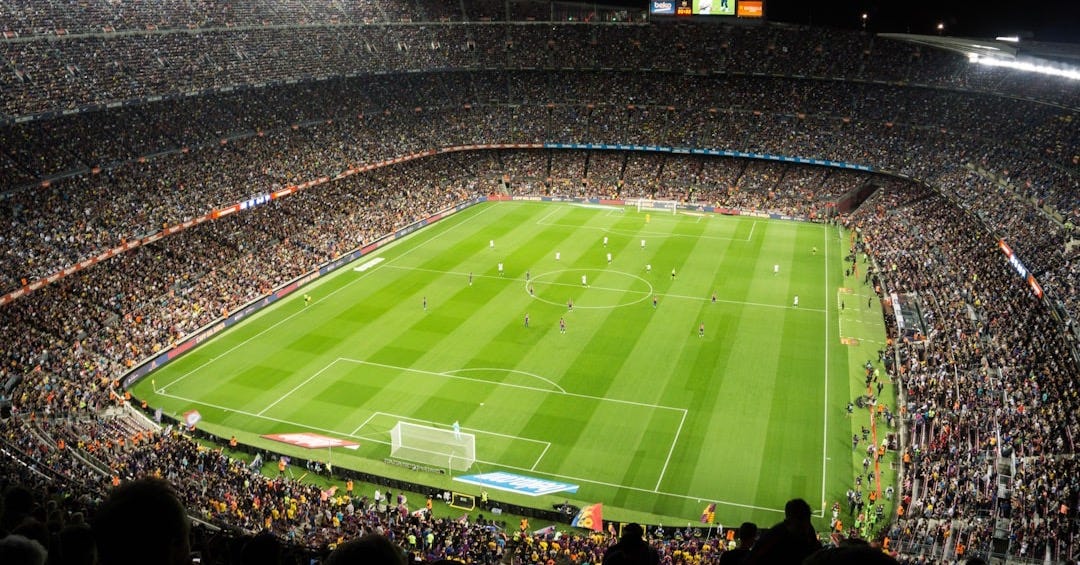 people watching soccer game in stadium people watching soccer game in stadium