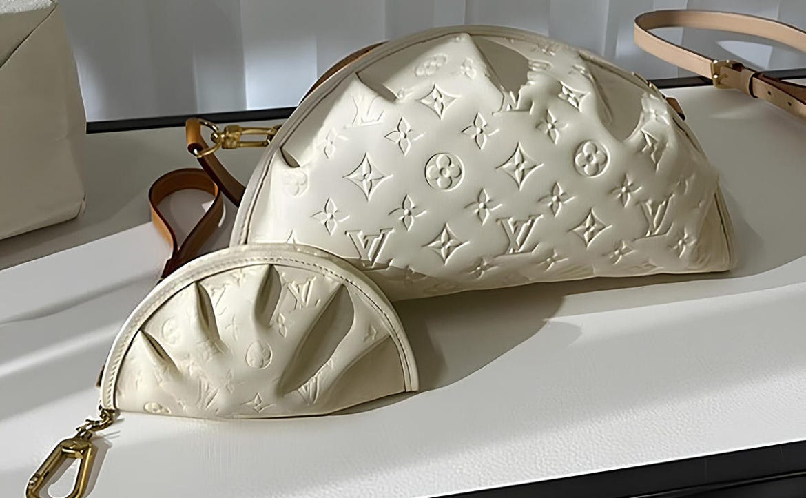 Louis Vuitton's semicircle gyoza bag with its monogram logo