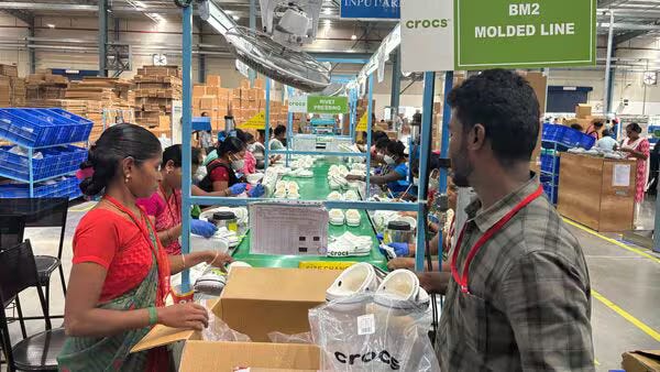 Workers pack footwear made for Crocs, at the factory of JR One Kothari Footwear, at Eraiyur in Tamil Nadu’s Perambalur district. (N. Madhavan)