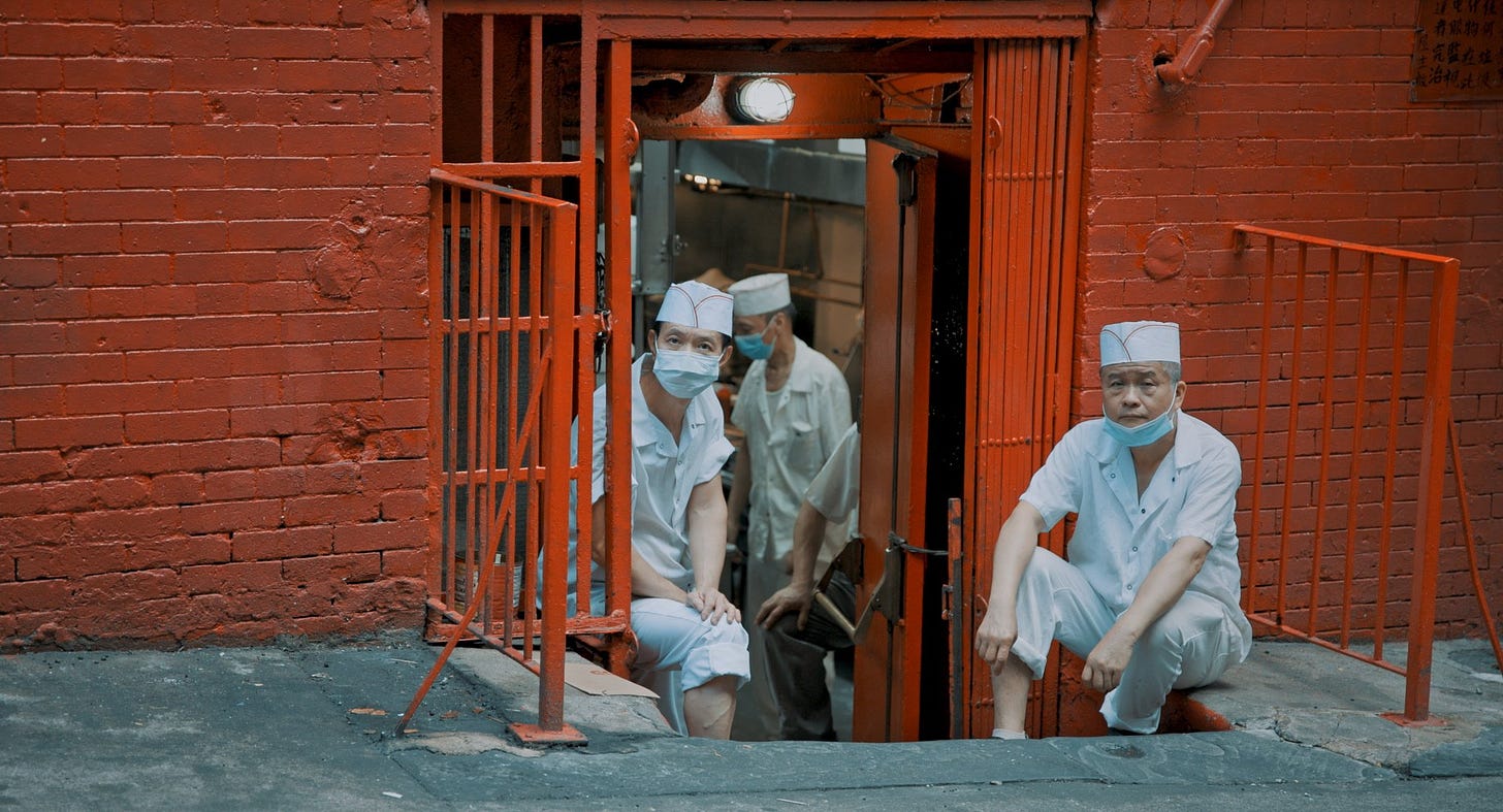 Chefs from New York Chinatown’s Hop Kee Restaurant having a break.