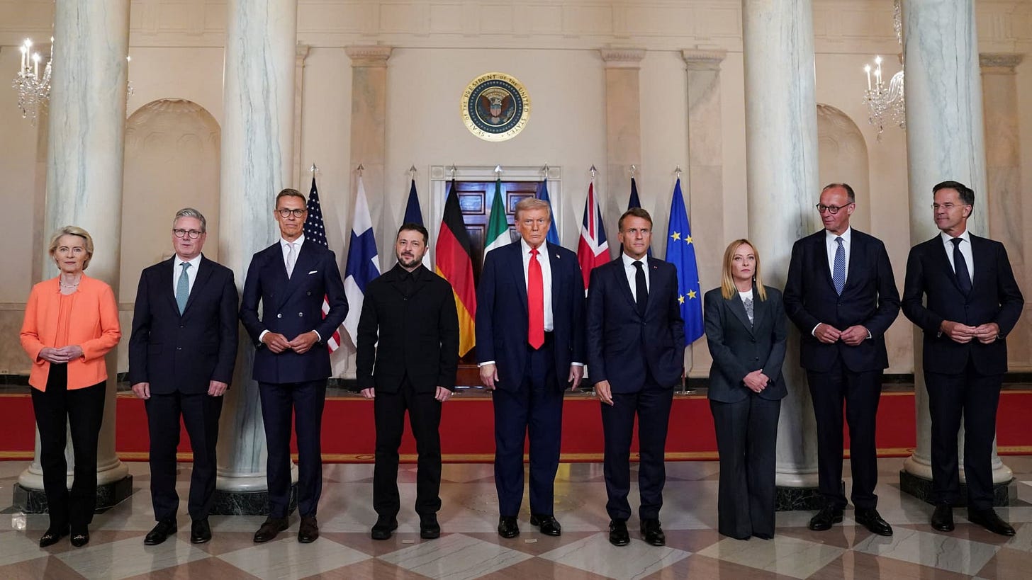 U.S. President Donald Trump, Ukrainian President Volodymyr Zelenskiy, German Chancellor Friedrich Merz, French President Emmanuel Macron, British Prime Minister Keir Starmer, Italian Prime Minister Giorgia Meloni, and Finland's President Alexander Stubb, NATO Secretary General Mark Rutte and European Commission President Ursula von der Leyen pose for a family photo amid negotiations to end the Russian war in Ukraine, at the White House in Washington, D.C., U.S., August 18, 2025. REUTERS/Alexander Drago U.S. President Donald Trump, Ukrainian President Volodymyr Zelenskiy, German Chancellor Friedrich Merz, French President Emmanuel Macron, British Prime Minister Keir Starmer, Italian Prime Minister Giorgia Meloni, and Finland's President Alexander Stubb, NATO Secretary General Mark Rutte and European Commission President Ursula von der Leyen pose for a family photo amid negotiations to end the Russian war in Ukraine, at the White House in Washington, D.C., U.S., August 18, 2025. REUTERS/Alexander Drago