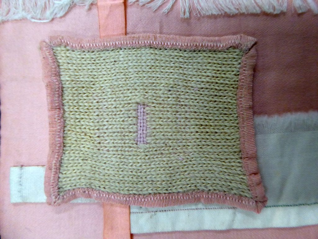 Pink and white darning.