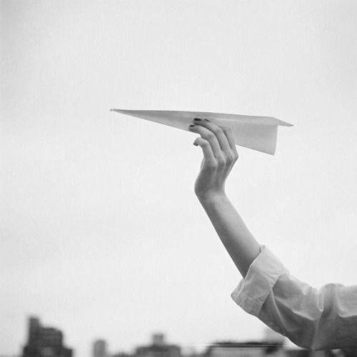 May be a black-and-white image of blimp May be a black-and-white image of blimp