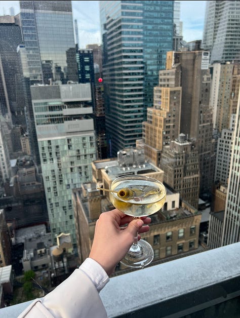 Photos of the Empire State Building and a dirty martinin at the Skylark Rooftop Bar in NYC.