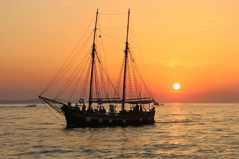 A ship floating on the sea.