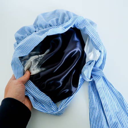 view on the inside of the handmade bonnet, lined with satin fabric view on the inside of the handmade bonnet, lined with satin fabric