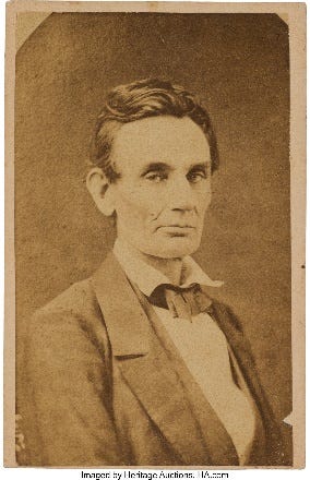 A person in a suit

AI-generated content may be incorrect.