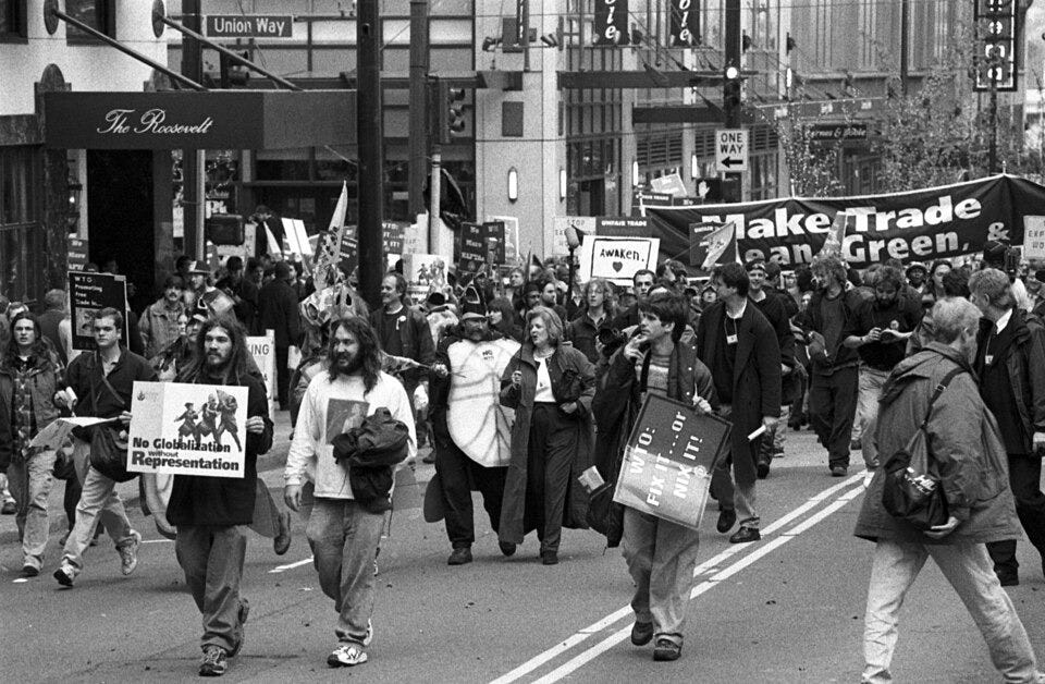 File:WTO protesters on 7th Avenue, 1999 - Flickr - Seattle Municipal Archives.jpg