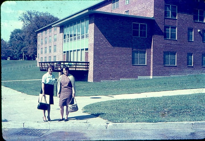 Two women, a mom and her daughter on a college campus